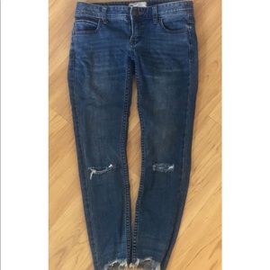 Free People distressed raw hem skinny jeans
